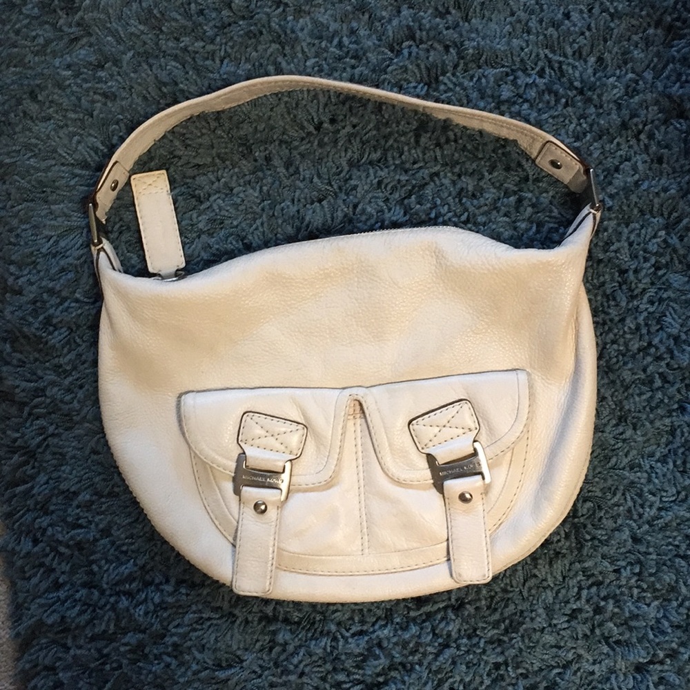 Michael Kors purse.  Saddle bag